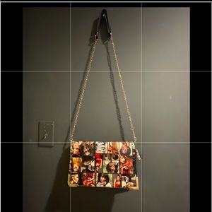 Wallet with photo print, with a small stain on the back.